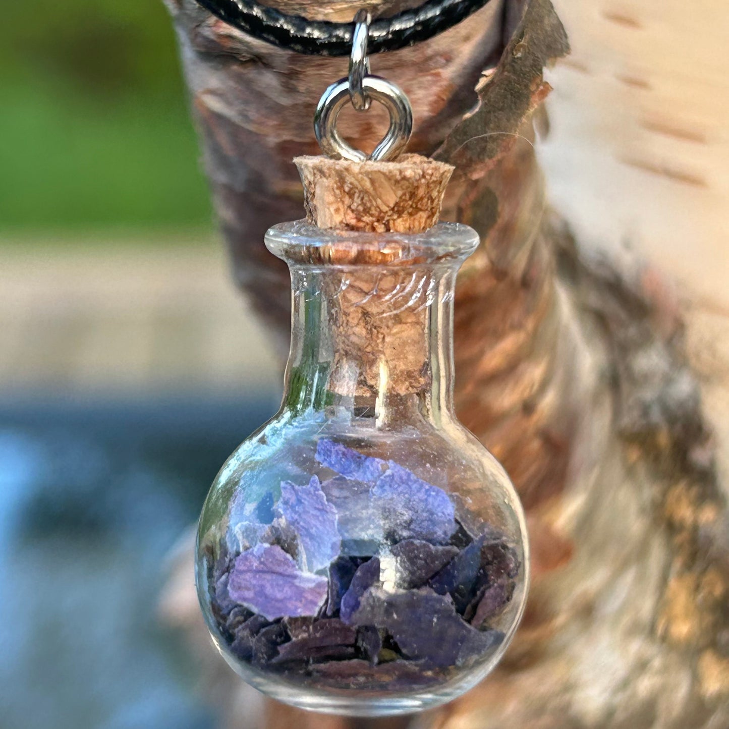 Peace spell bottle necklace